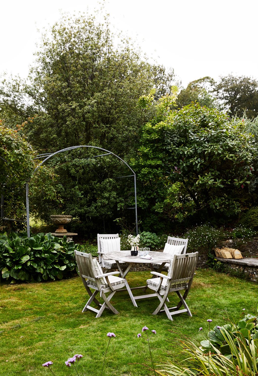 Image may contain Plant Grass Furniture Chair Lawn Table Dining Table Tabletop and Patio