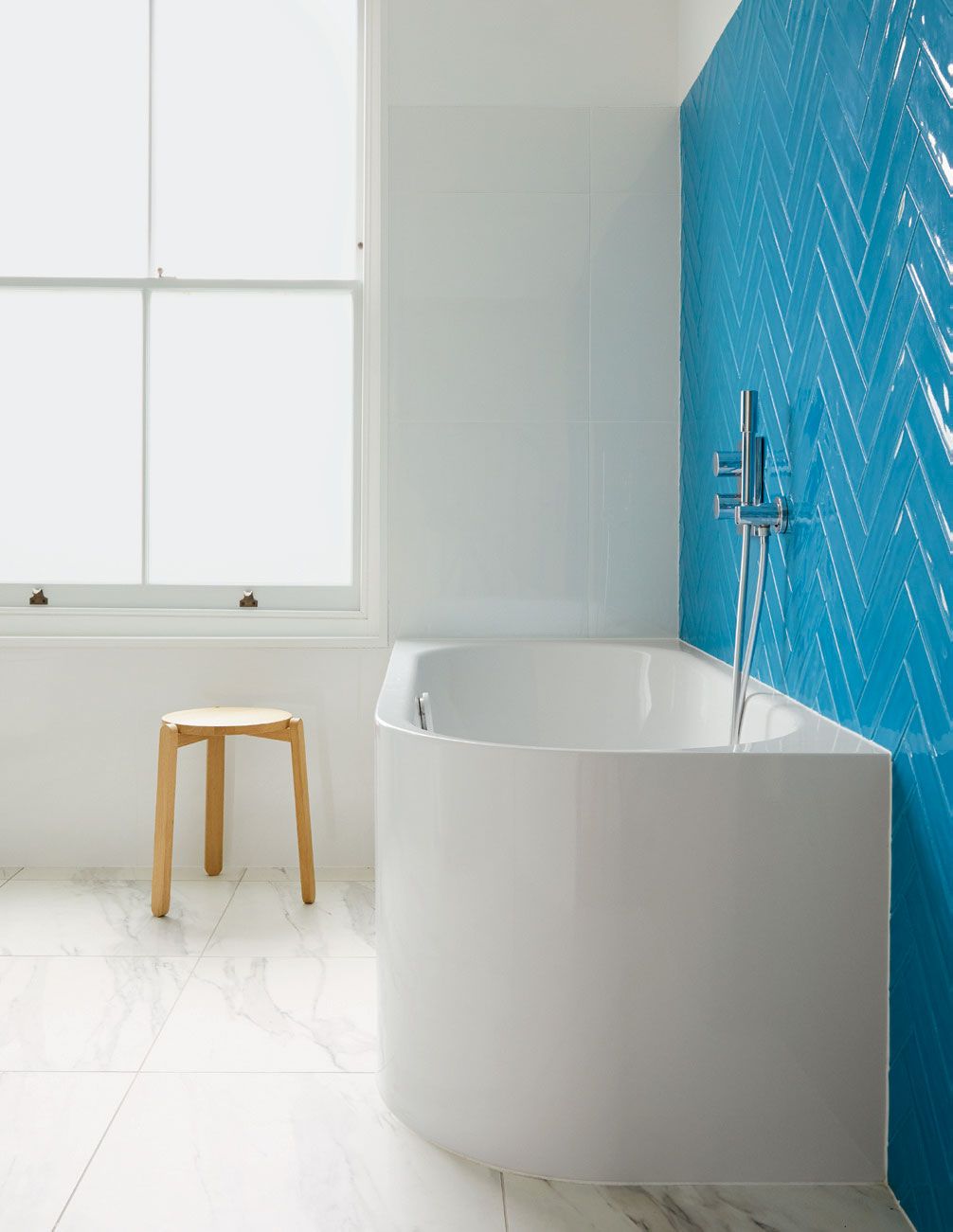 Image may contain Tub Bathtub Furniture Indoors Room and Bar Stool