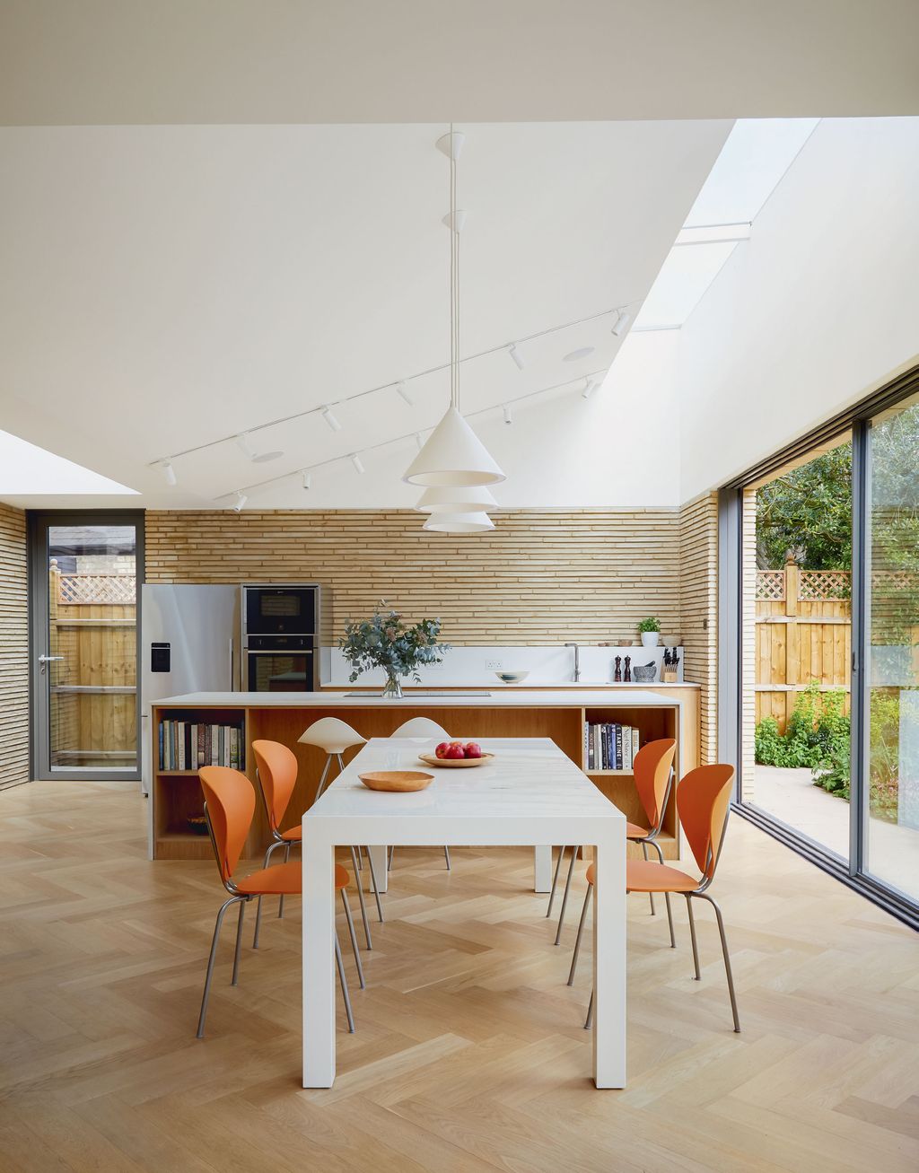 Image may contain Furniture Chair Wood Interior Design Indoors Housing Building Dining Table Table and Flooring