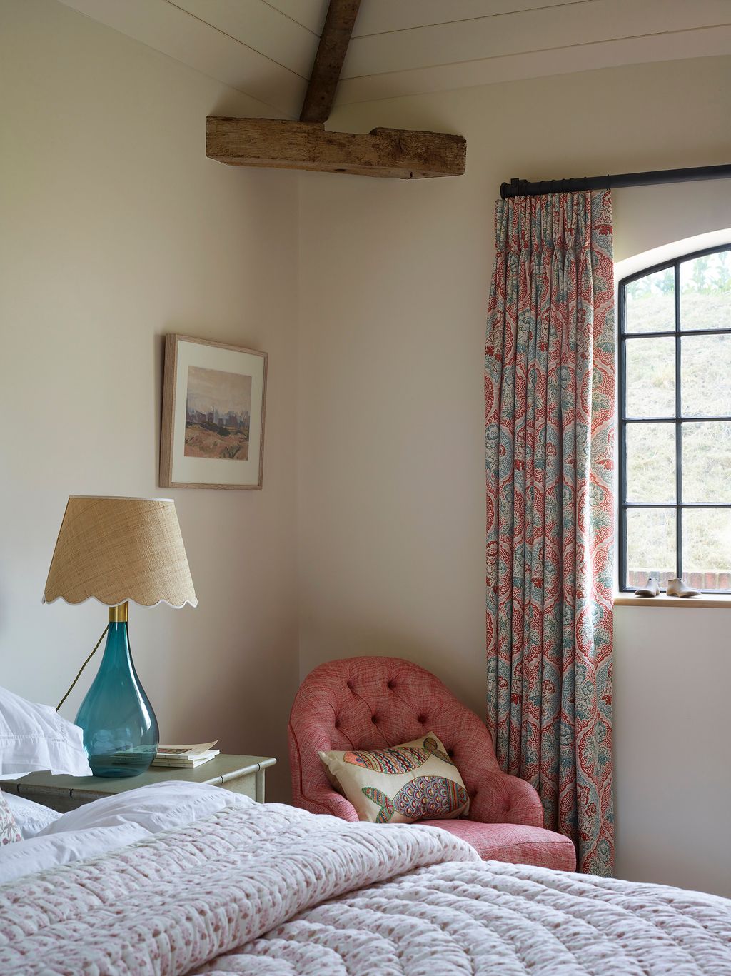 Image may contain Furniture Room Bedroom Indoors Bed Interior Design Living Room Lamp and Table Lamp