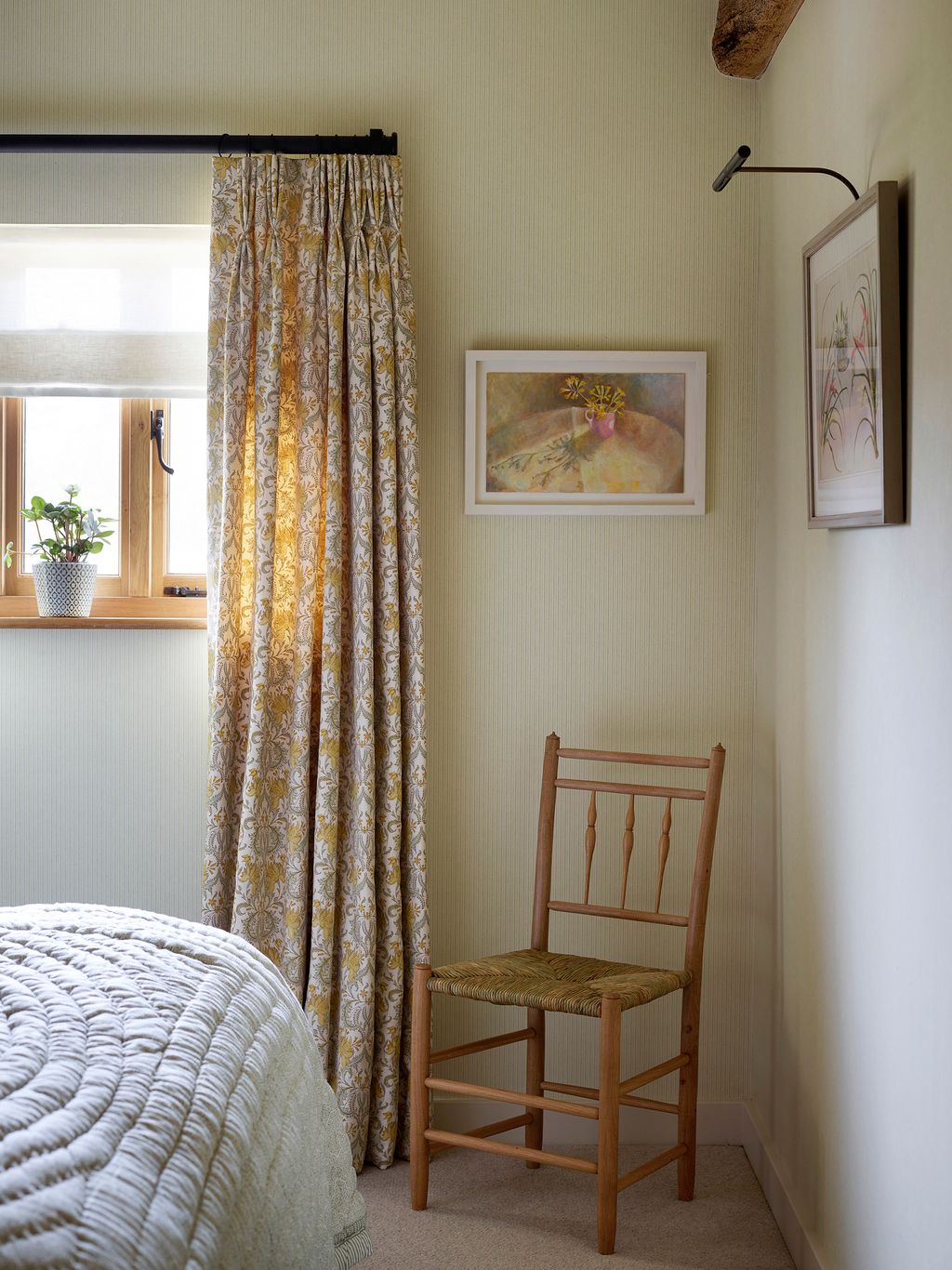 The chair is a madetoorder piece by Lawrence Neal. The curtain is ‘Acanthus by Pukka Prints sourced at Tissus dHlène.