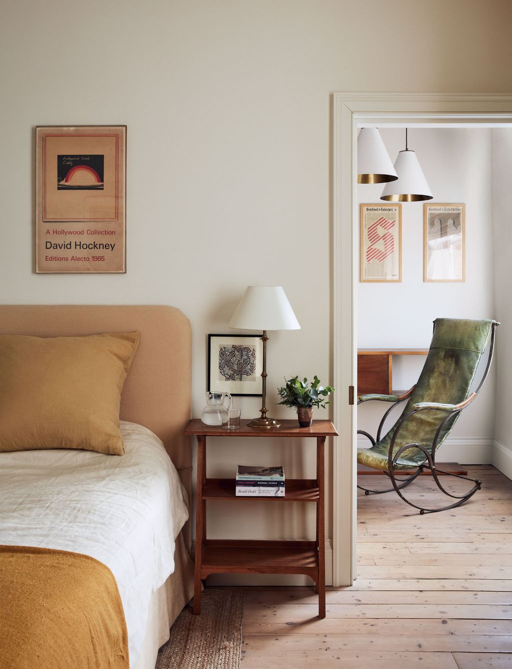 Image may contain Room Bedroom Indoors Furniture Wood Interior Design Living Room Flooring Bed and Dorm Room