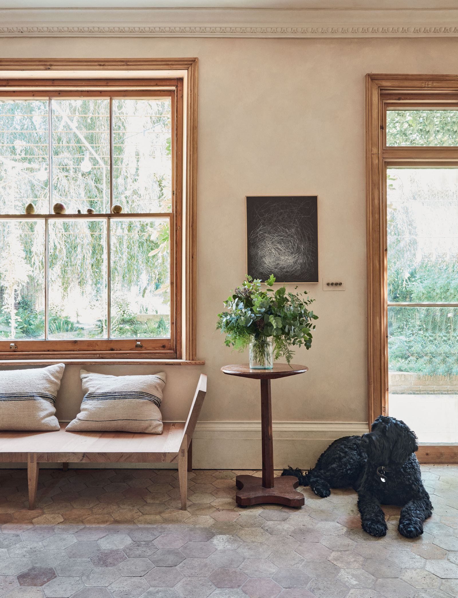 Image may contain Picture Window Cushion Furniture and Window