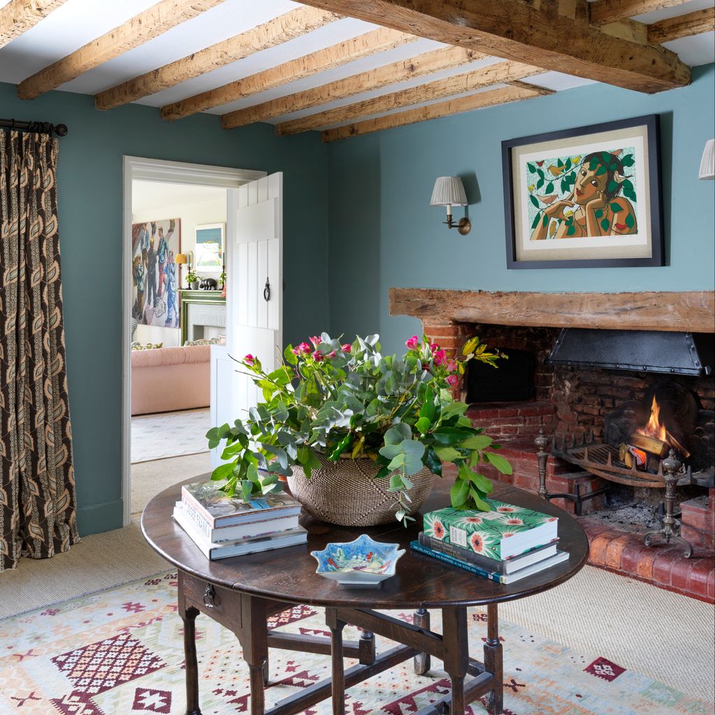 Image may contain Living Room Room Indoors Interior Design Furniture Marie Laurencin Table Hearth and Fireplace