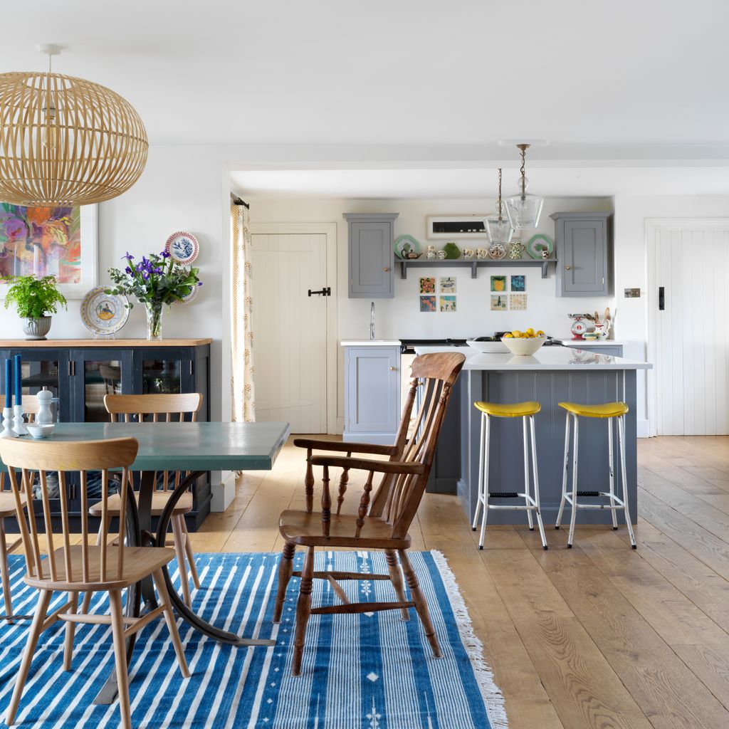 Image may contain Furniture Interior Design Indoors Chair Room Flooring Dining Room Table and Living Room