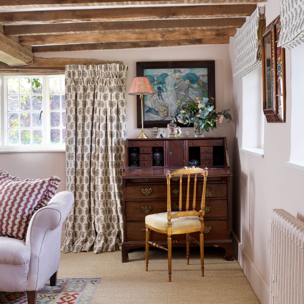 Image may contain Interior Design Indoors Living Room Room Furniture Home Decor Wood Flooring Hardwood and Bedroom