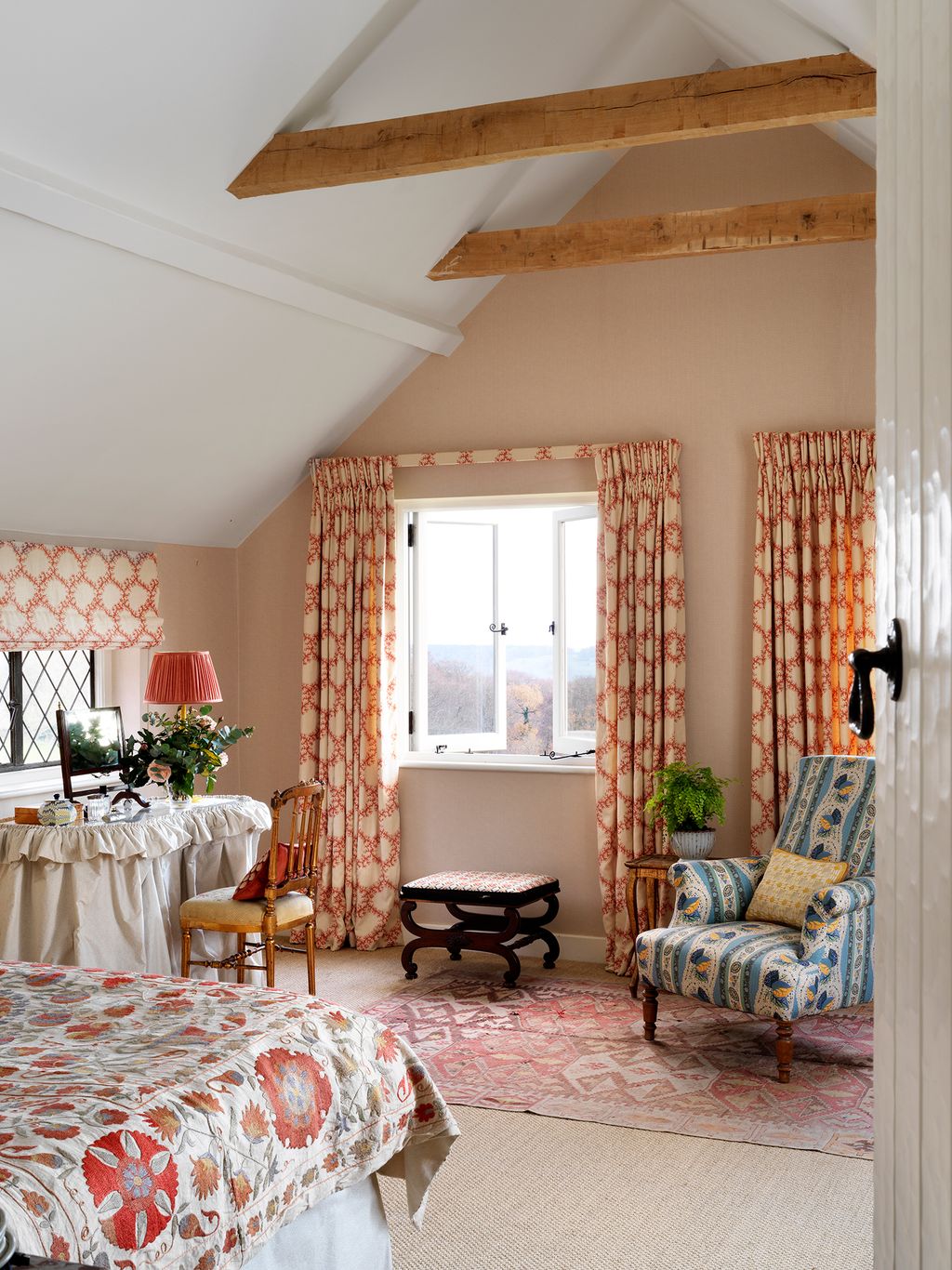 Image may contain Home Decor Living Room Room Indoors Interior Design Furniture Flooring and Couch