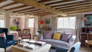 Image may contain Living Room Room Indoors Furniture Couch and Table