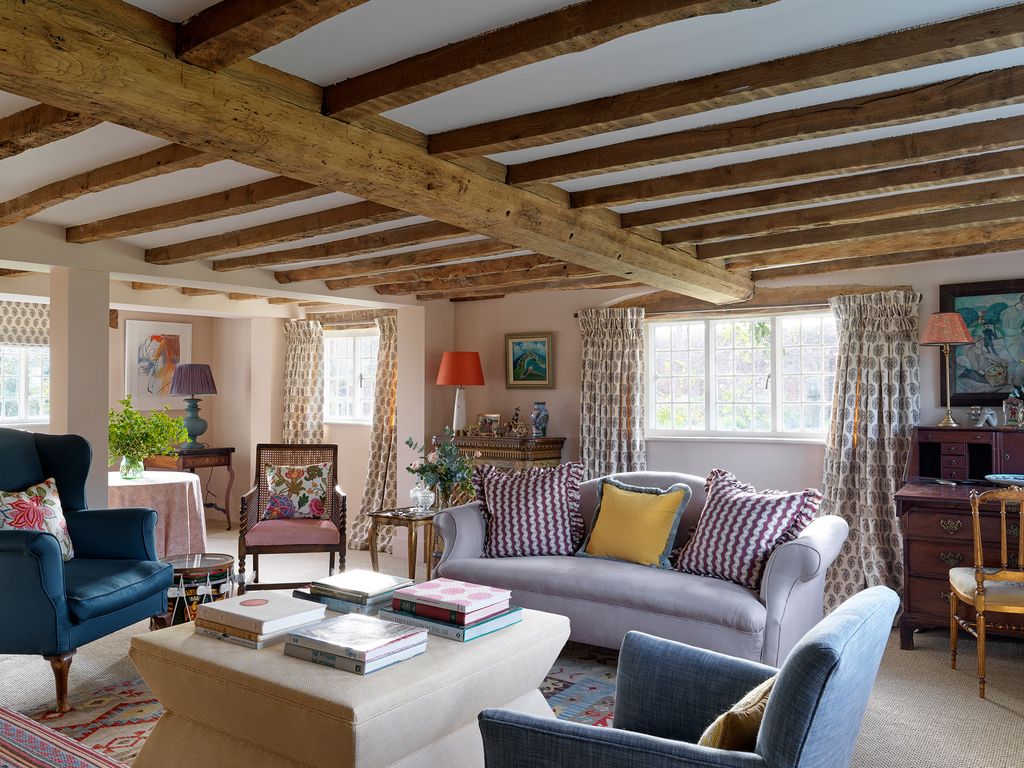 Image may contain Living Room Room Indoors Furniture Couch and Table