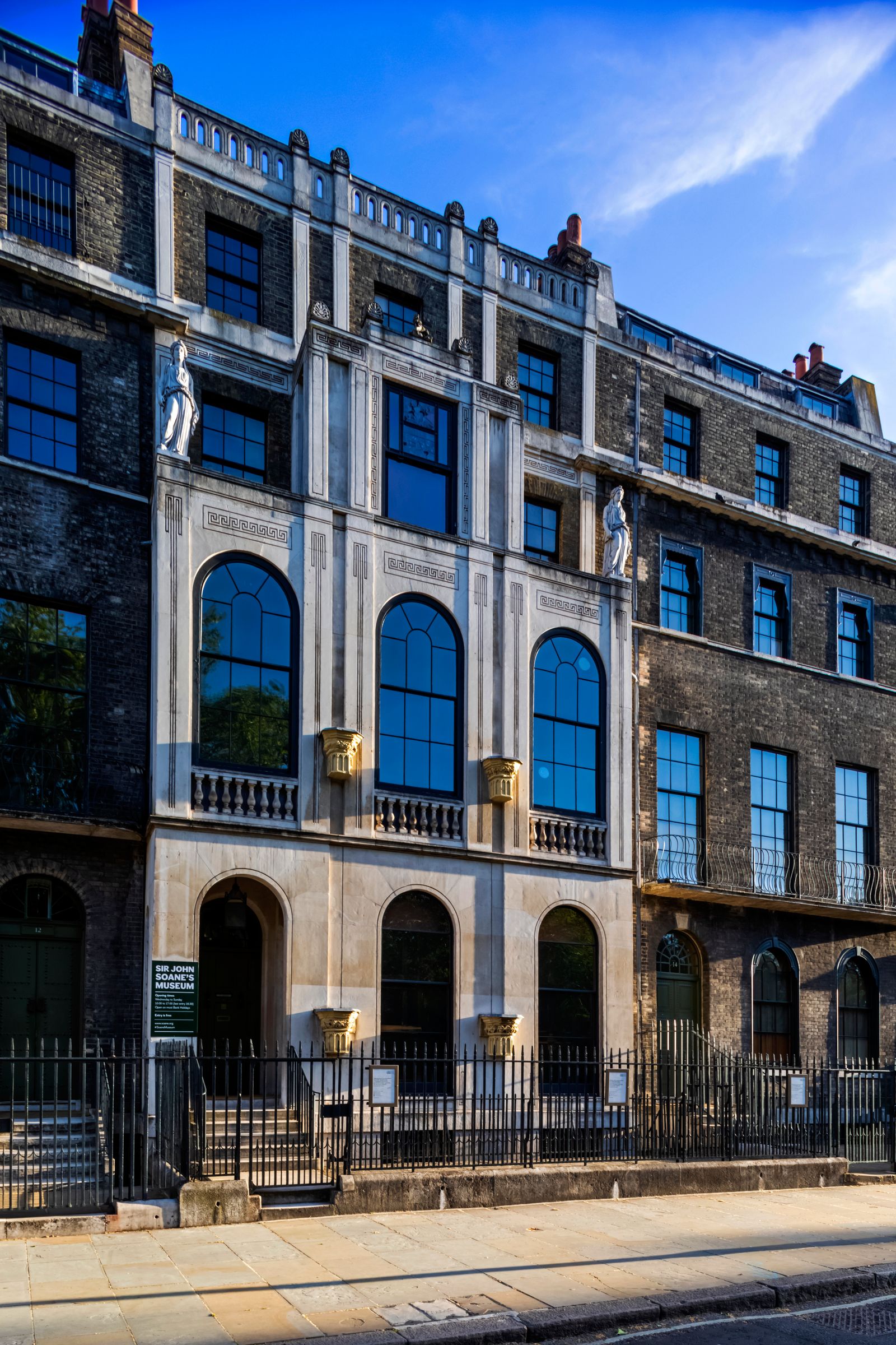 Image may contain City Town Urban Building High Rise Apartment Building Office Building Architecture and Downtown