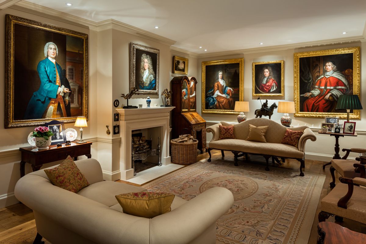 Image may contain Living Room Room Indoors Furniture Couch Human Person Flooring Interior Design and Rug