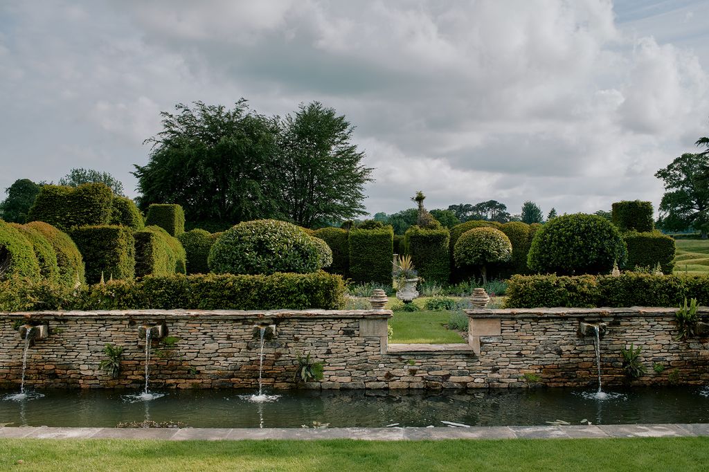 Keith and Glen decided to add the stone fountains and koi carp pond just outside the garden. Above this sits a more...