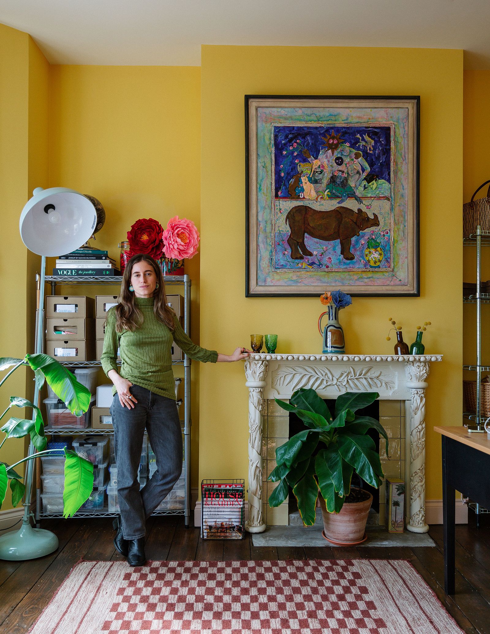 Image may contain Human Person Pants Clothing Apparel Flooring Living Room Indoors Room Wood and Home Decor