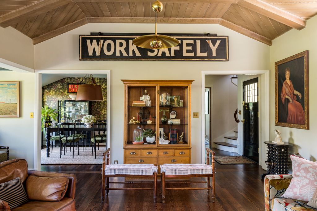 The sign is vintage  “Another example of an item that we purchased to add a touch of humour to the space” as Lauren...