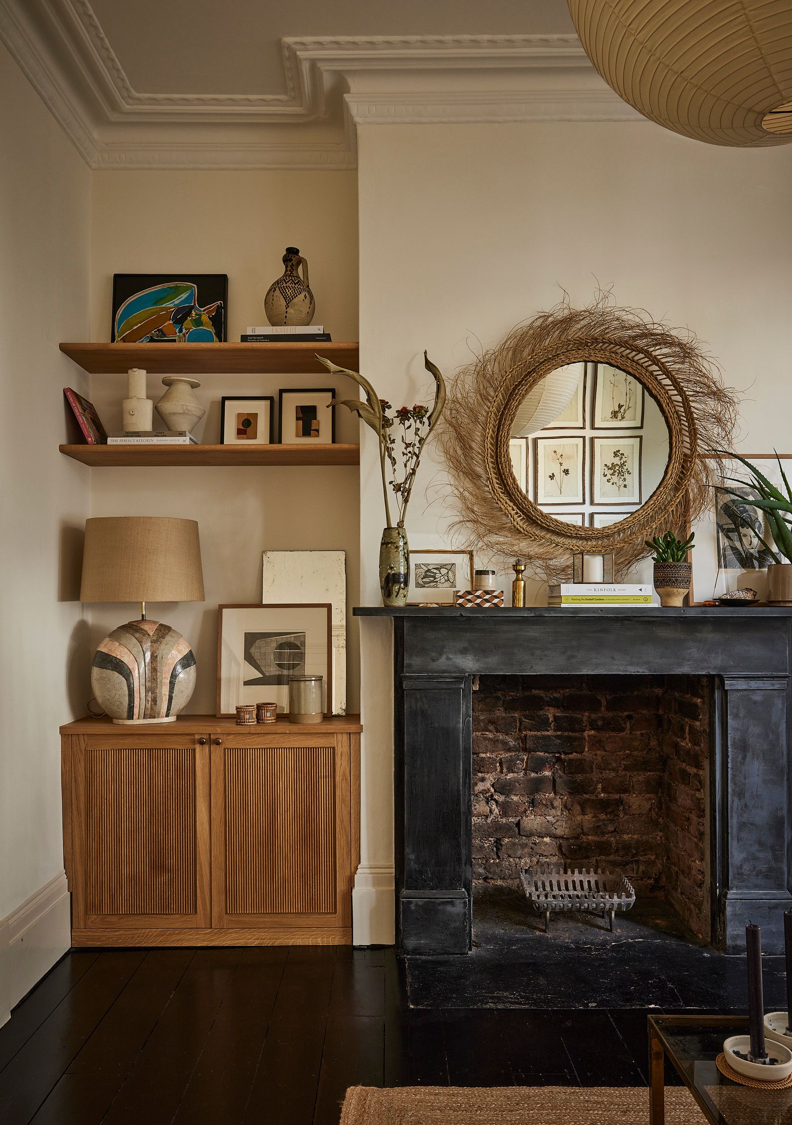 Image may contain Indoors Fireplace Living Room Room Hearth Furniture and Interior Design