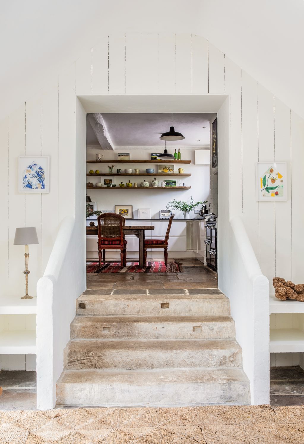 Image may contain Furniture Chair Interior Design Indoors Room Living Room Housing Building Shelf and Flooring