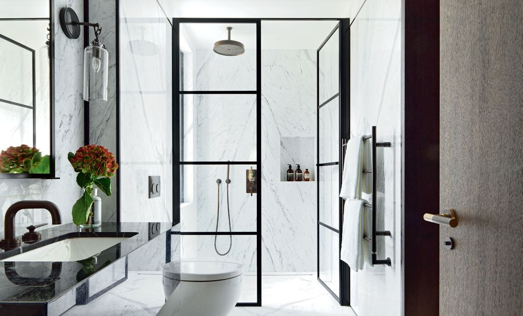 Image may contain Indoors Room Interior Design Door and Bathroom