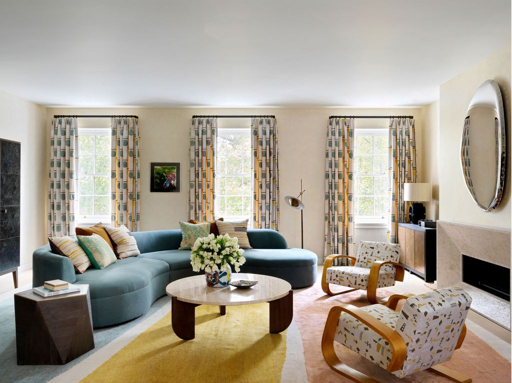 Walls in a faux parchment paint finish by Mathew Bray  Matthew Collins are the backdrop for a bespoke sofa by Natalia...