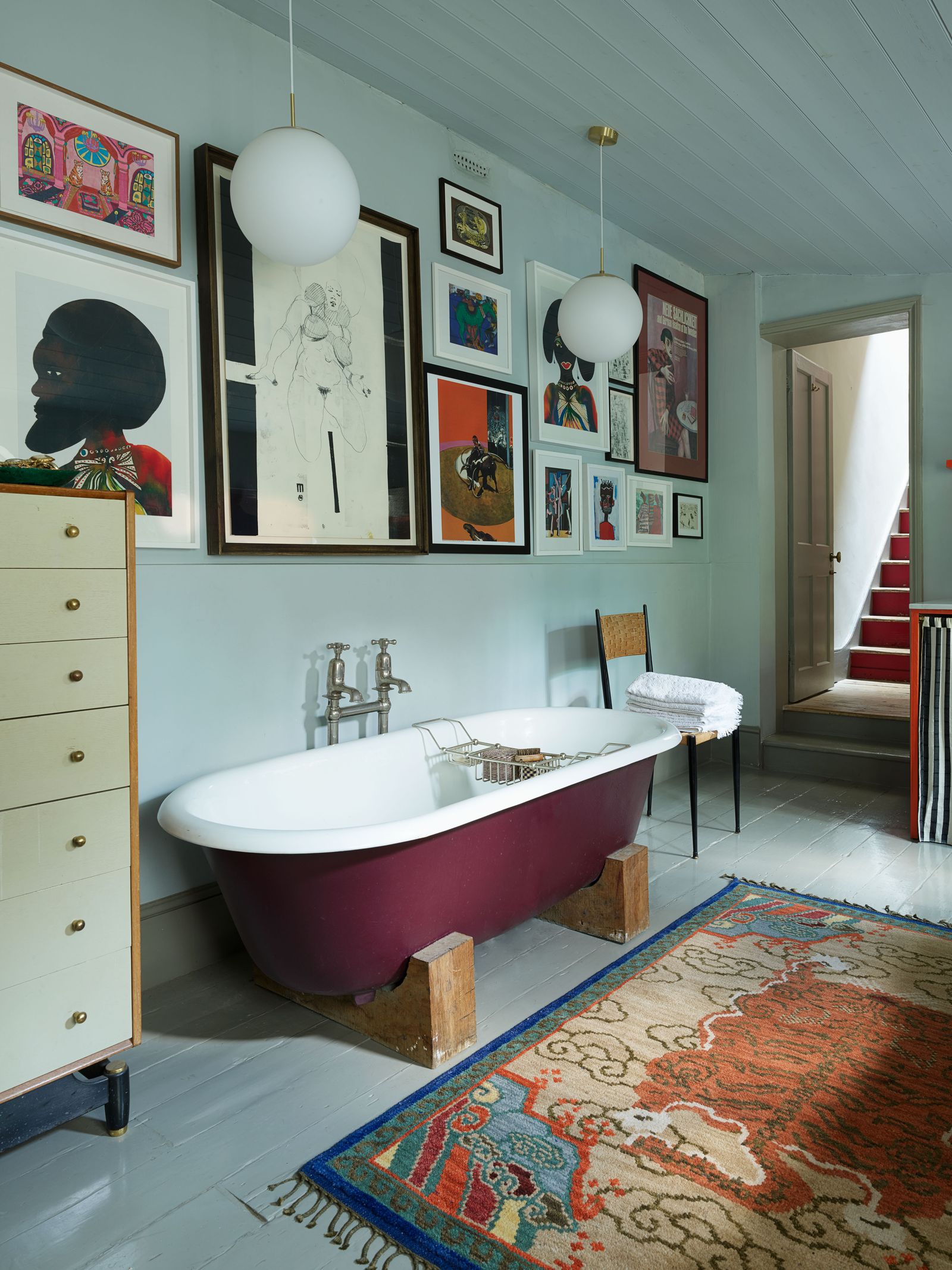 Image may contain Bathtub Tub Interior Design Indoors Room Living Room Furniture and Rug