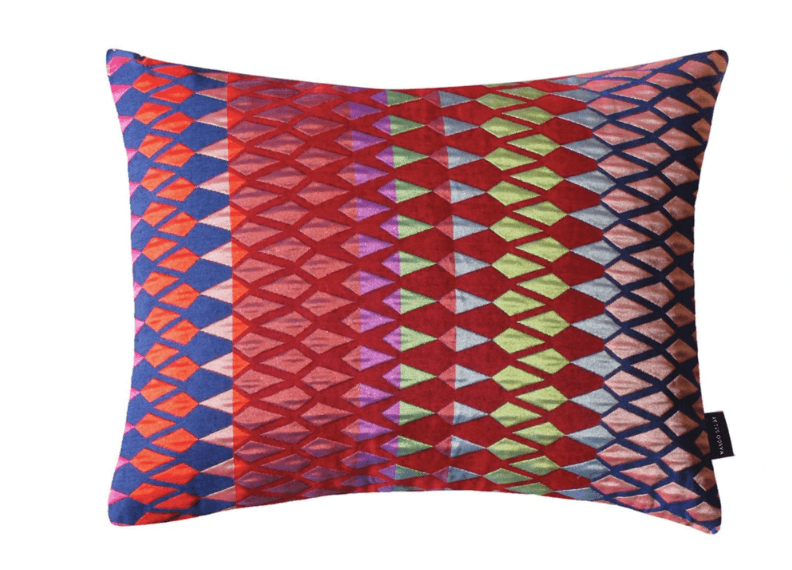 Image may contain Cushion Pillow and Rug