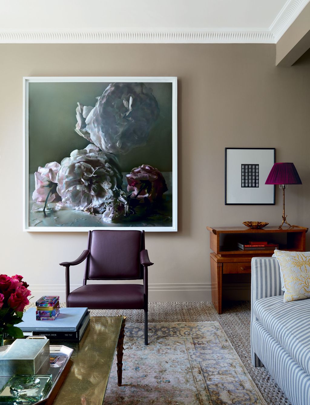 Image may contain Living Room Room Indoors Furniture Interior Design Chair Couch Plant Flower and Blossom