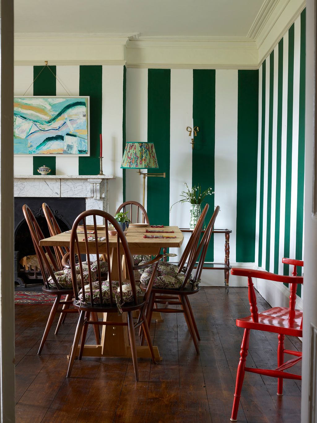 Image may contain Furniture Chair Wood Flooring Interior Design Indoors Room Hardwood Dining Table Table and Floor