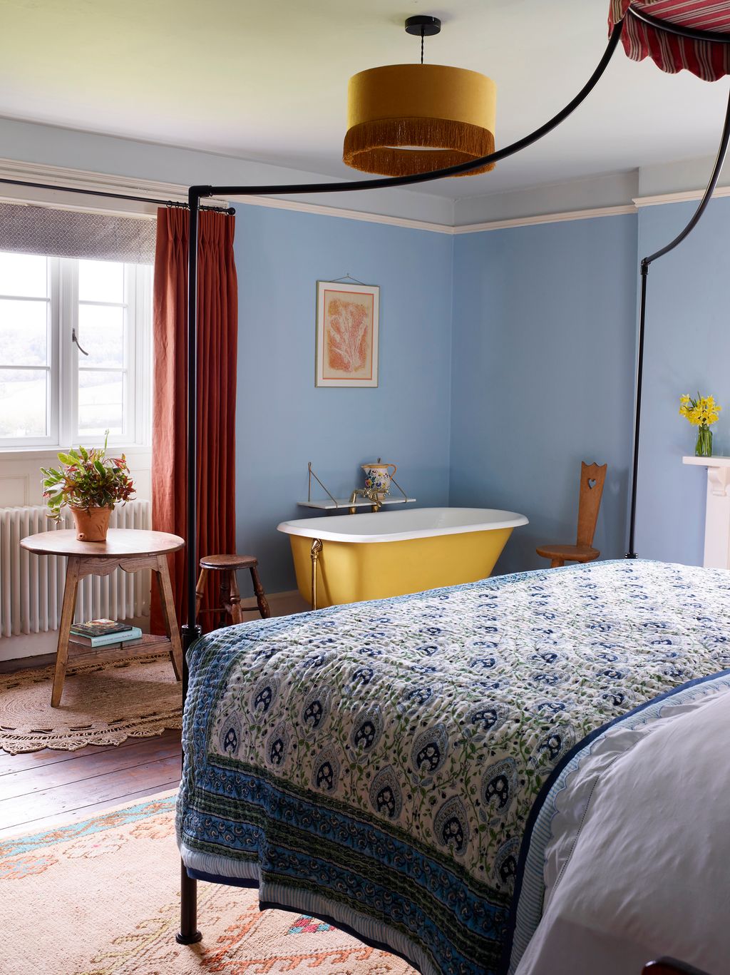 Image may contain Furniture Room Bedroom Indoors Bed Flooring Human and Person