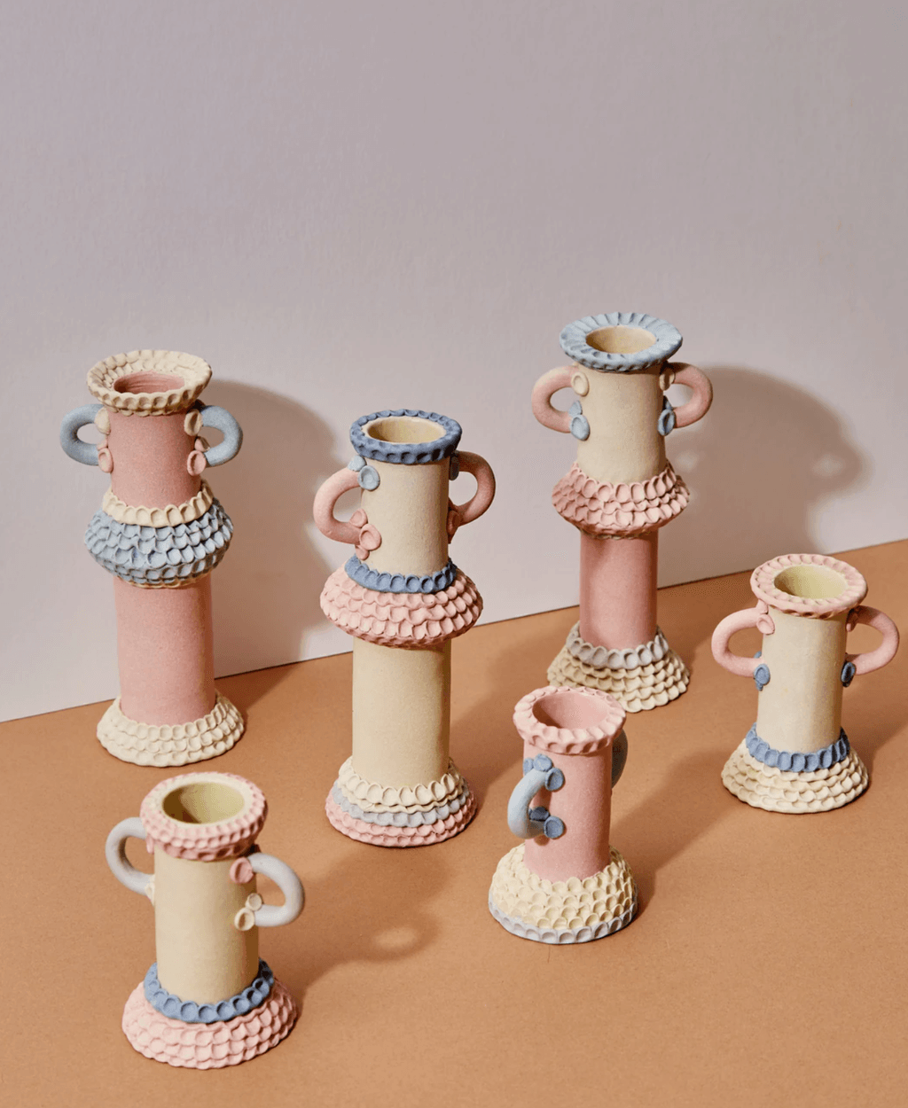 Image may contain Pottery Art Porcelain Vase Jar and Saucer