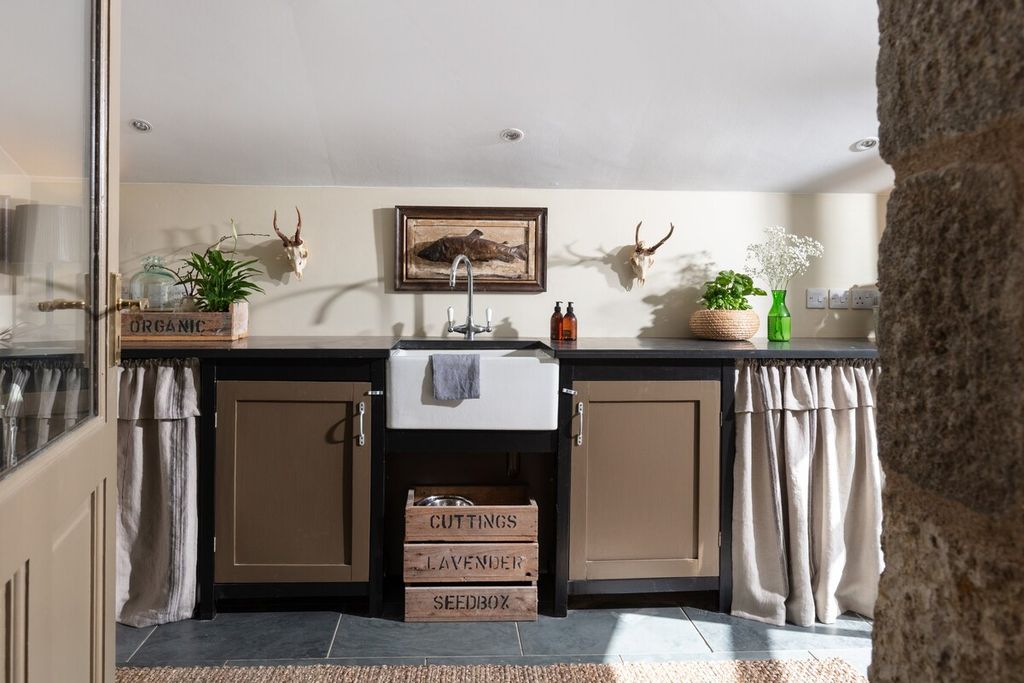 Image may contain Furniture Sideboard Interior Design Indoors Room Cabinet Living Room and Home Decor