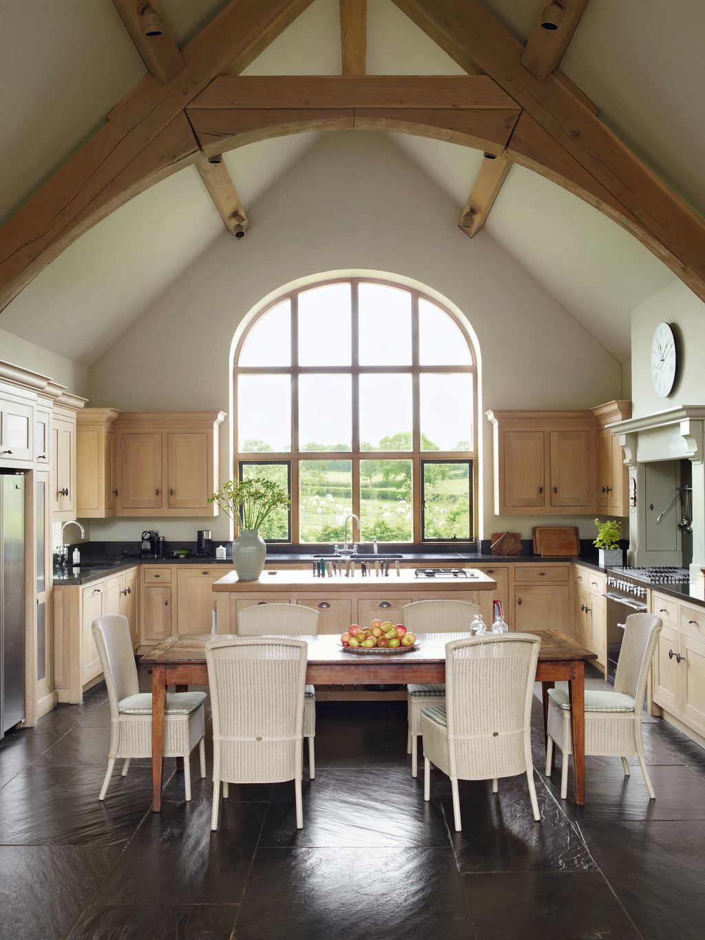 Image may contain Indoors Room Kitchen Furniture Chair and Kitchen Island