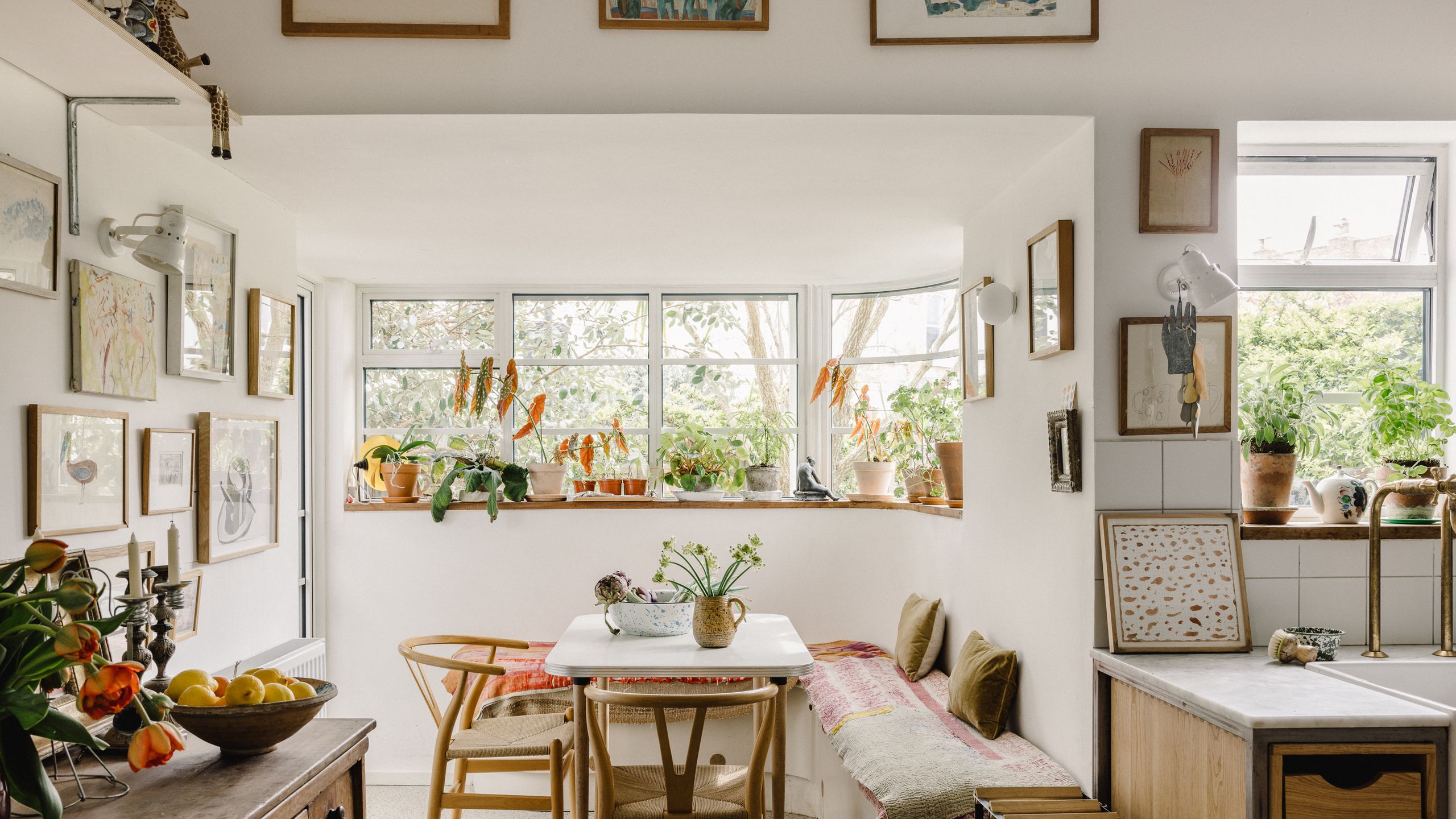 Image may contain Flooring Interior Design Indoors Wood Home Decor Furniture Room Table Living Room and Floor