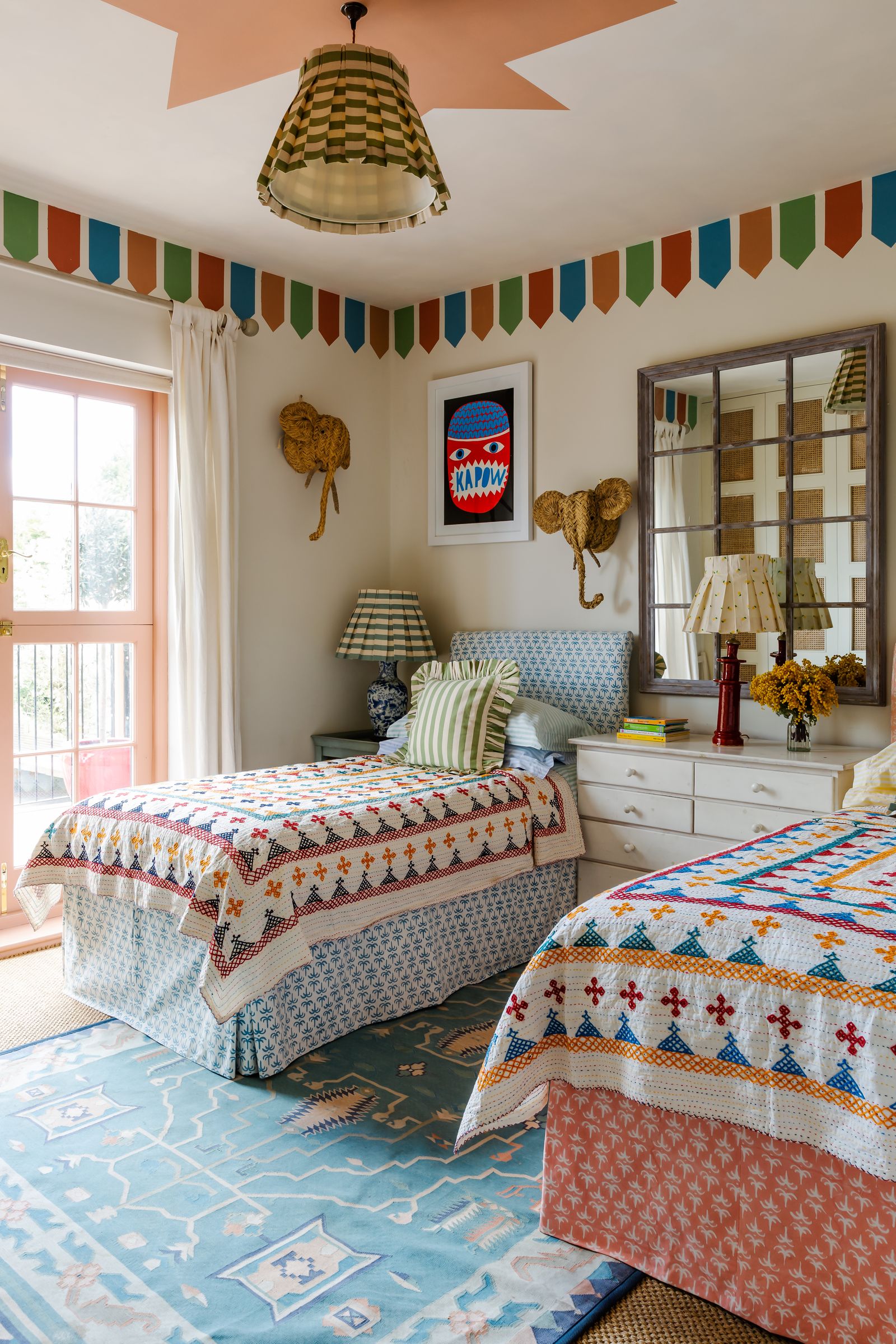 Image may contain Indoors Room Bedroom Dorm Room Rug and Furniture