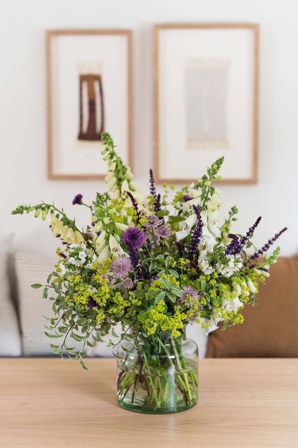 Filler flowers such as Alchemilla mollis and salvias bridge the space between focals and add another layer of interest.