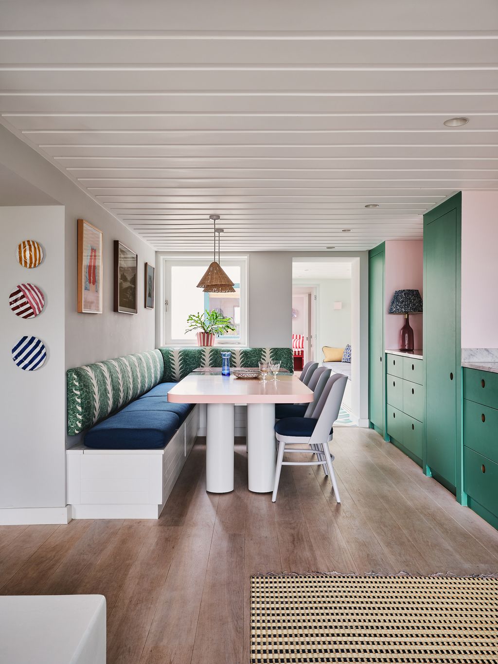 Image may contain Flooring Furniture Chair Interior Design Indoors Wood Floor Hardwood Room and Rug