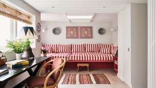 Image may contain Furniture Chair Indoors Room Living Room Interior Design and Rug