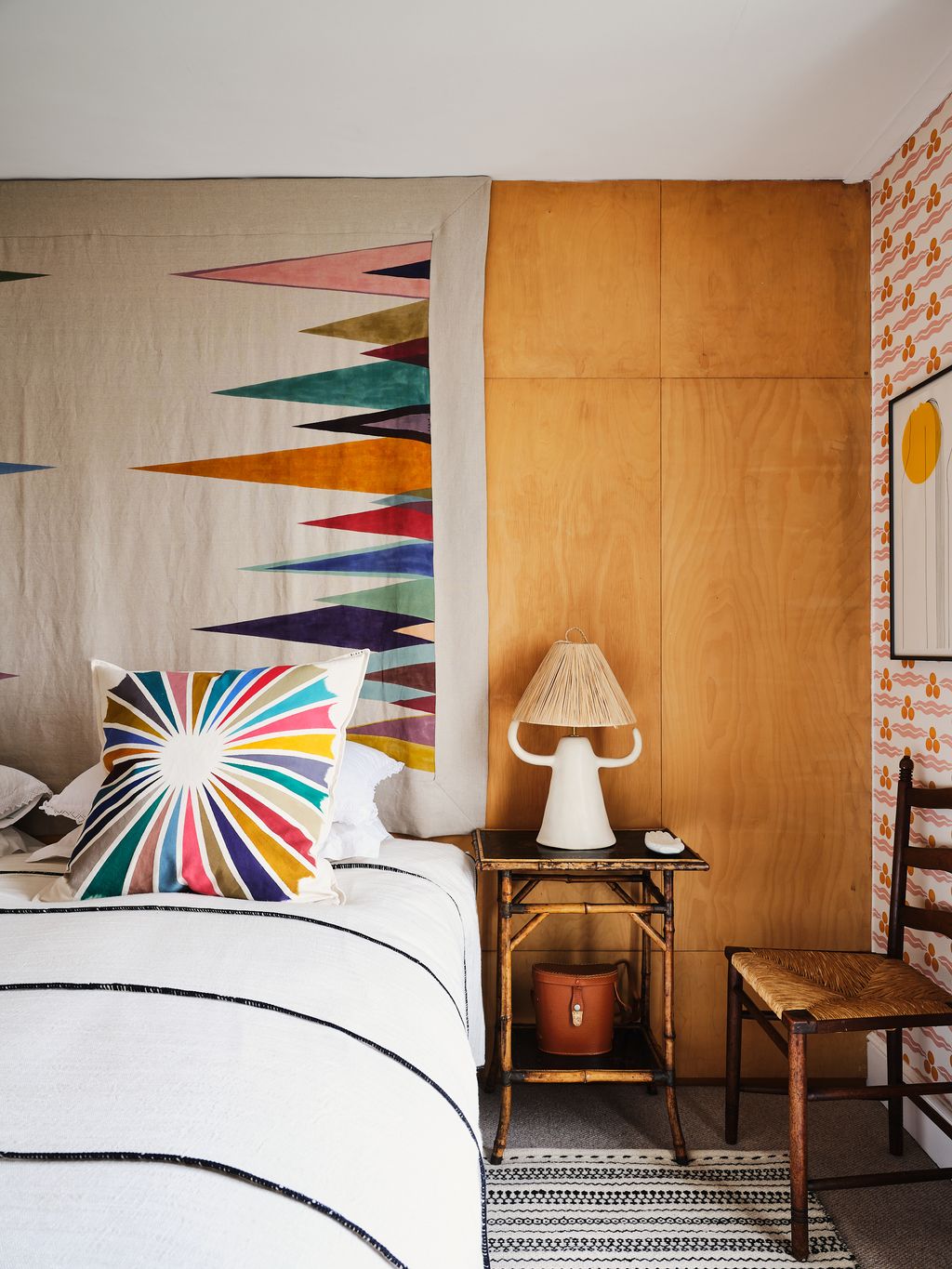 Image may contain Lamp Table Lamp Cushion Pillow Furniture Interior Design Indoors Living Room Room and Chair