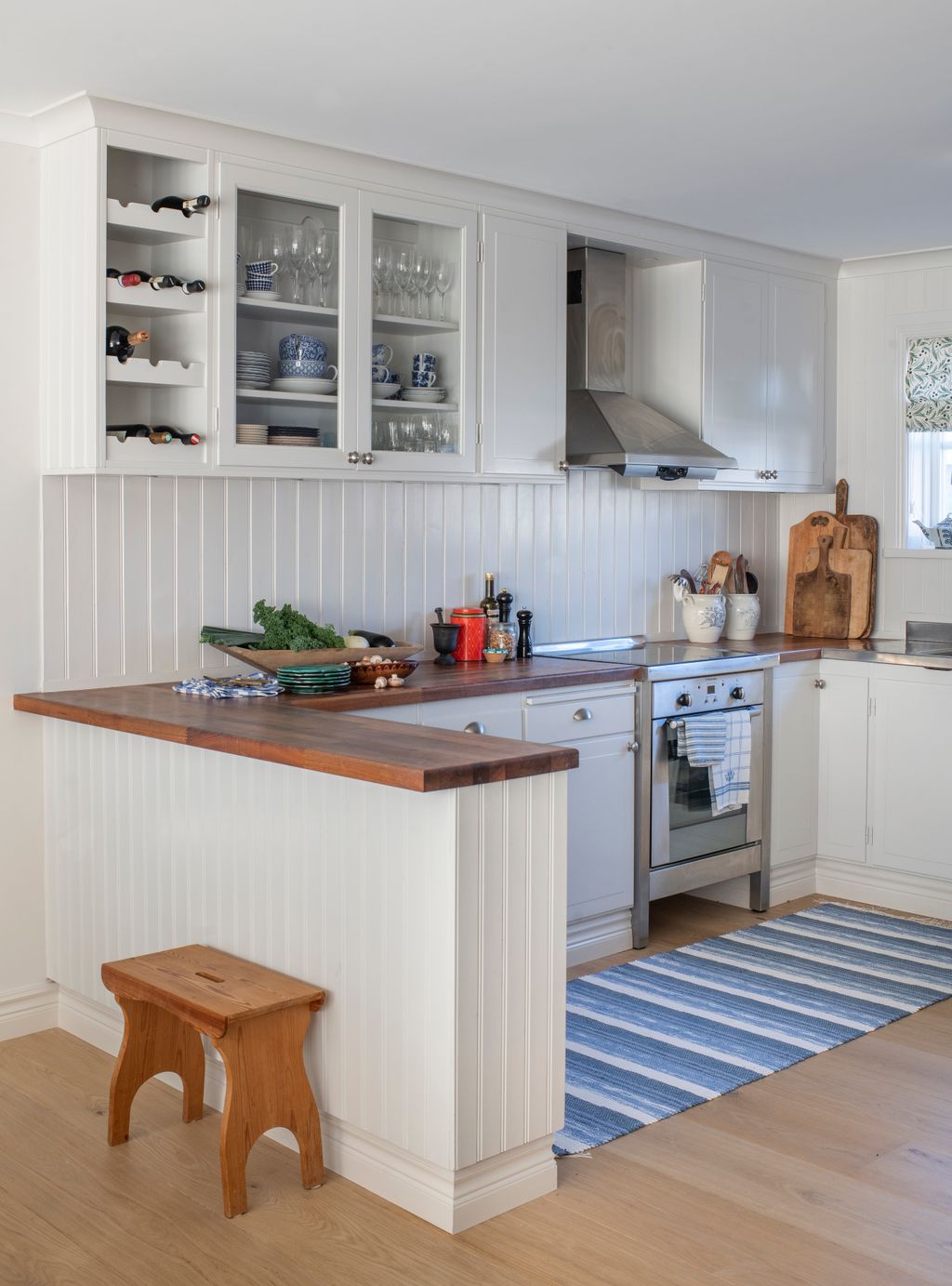 Image may contain Furniture Indoors Room Kitchen Island Wood and Kitchen