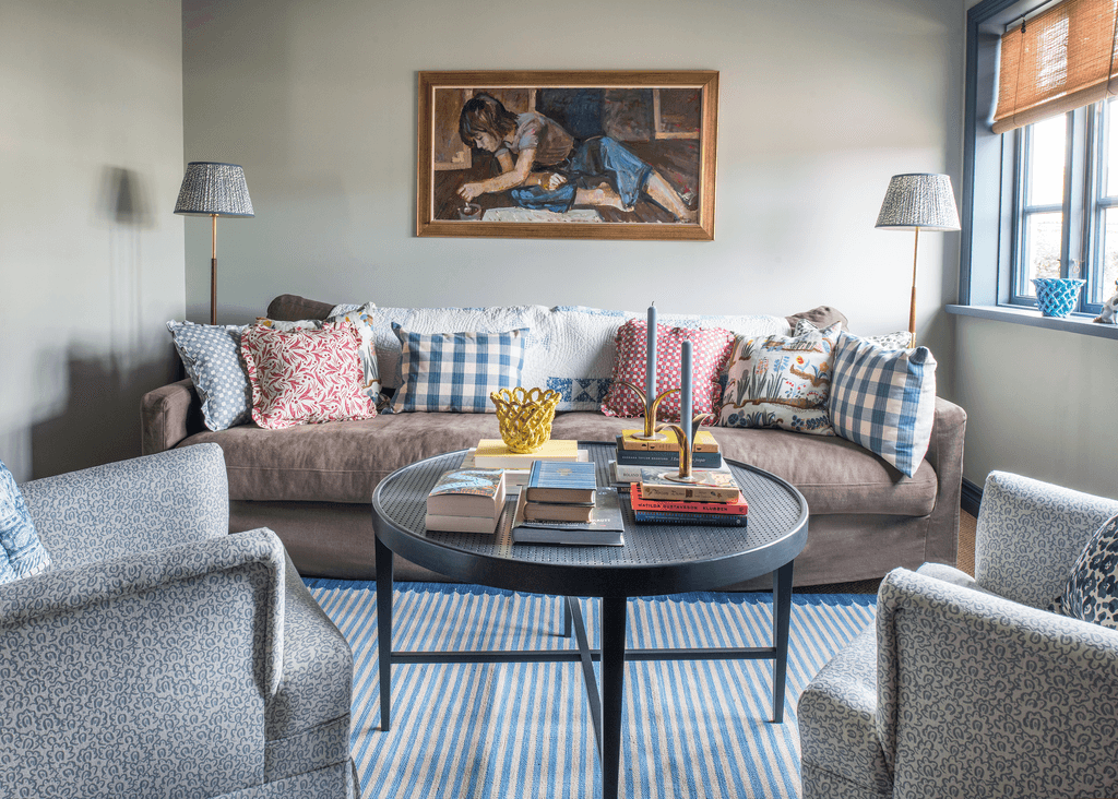 Image may contain Furniture Couch Table Living Room Indoors Room Coffee Table and Rug