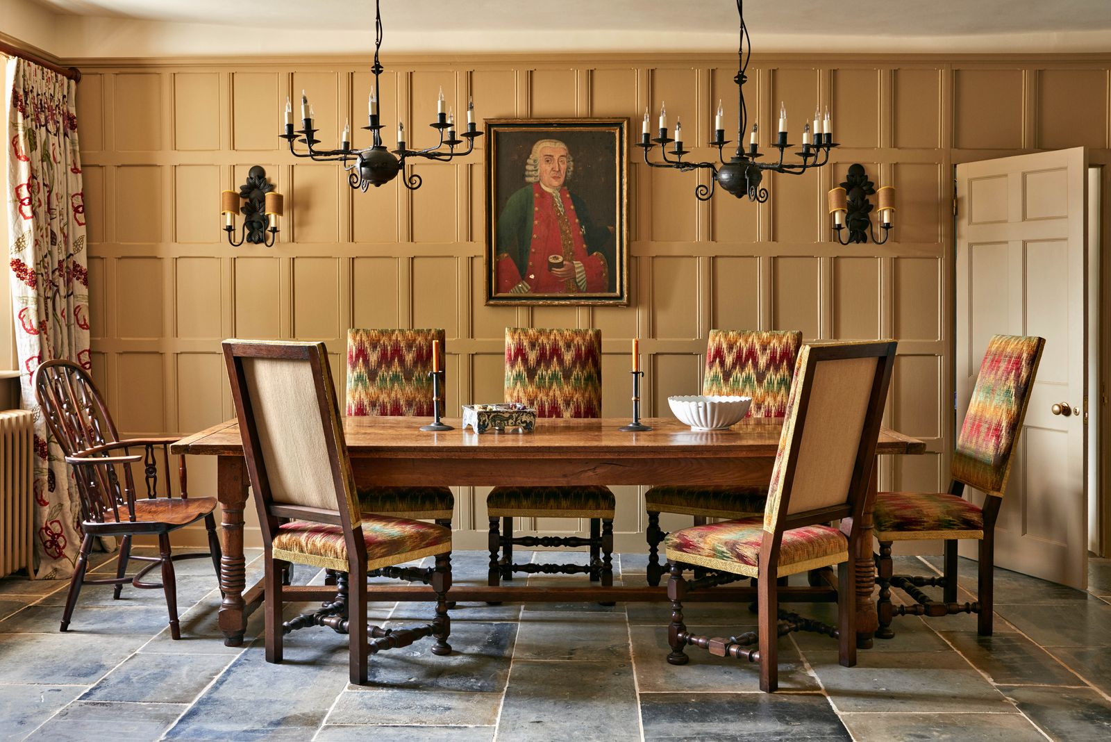 Image may contain Furniture Chair Room Indoors Dining Room Dining Table Table Human Person Flooring and Wood