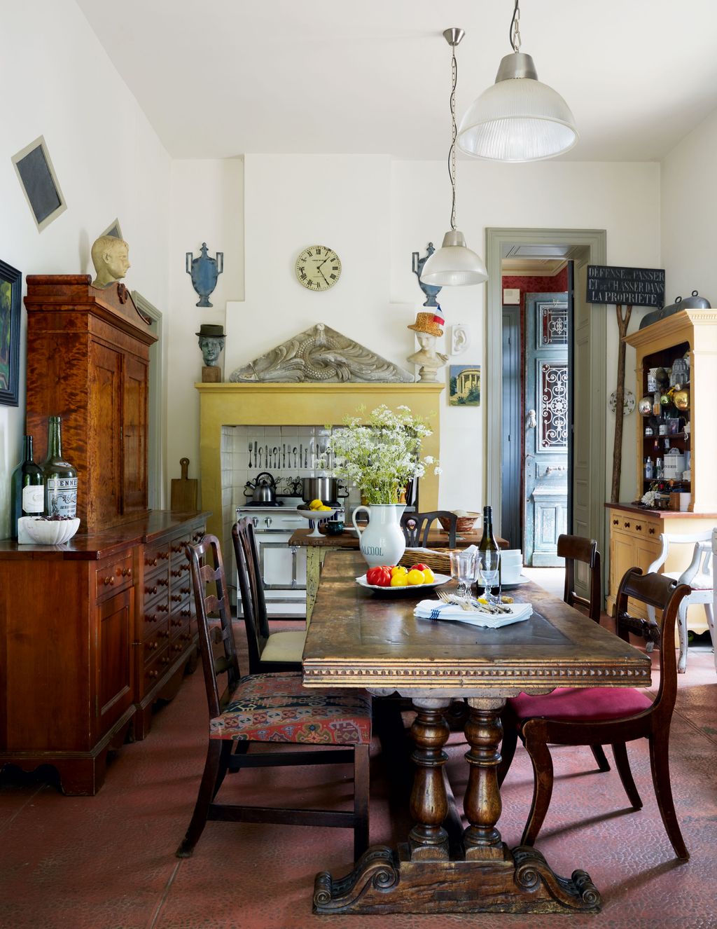 Image may contain Furniture Chair Indoors Room Dining Room Interior Design Wood Hardwood Living Room and Flooring