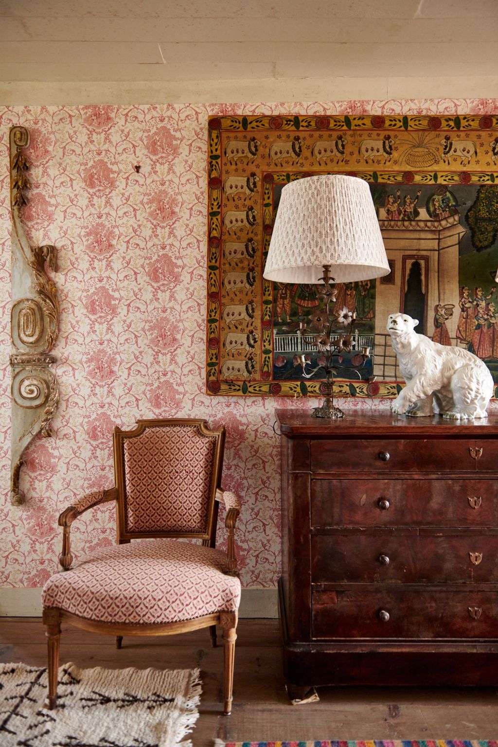 Image may contain Furniture Chair Interior Design Indoors Living Room Room Cabinet Lamp Animal Dog Mammal and Pet