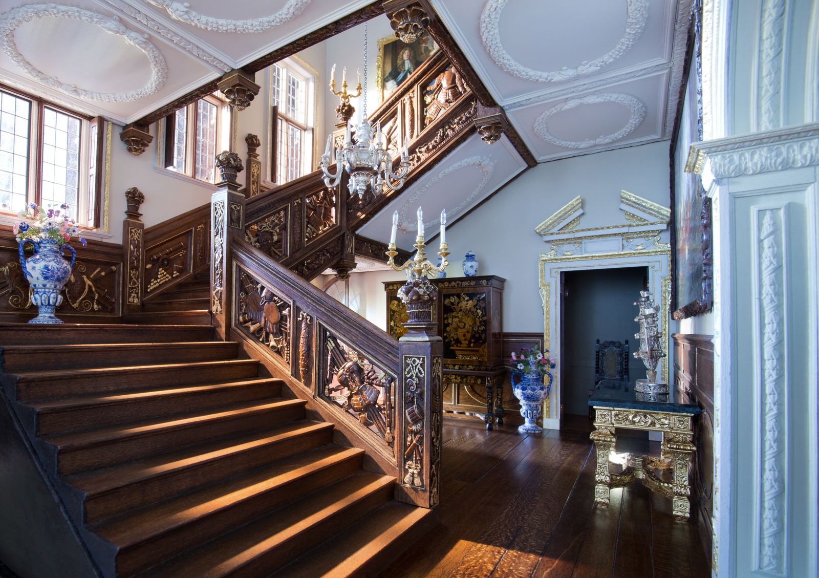 Image may contain Flooring Wood Banister Handrail Hardwood Floor Staircase Interior Design and Indoors