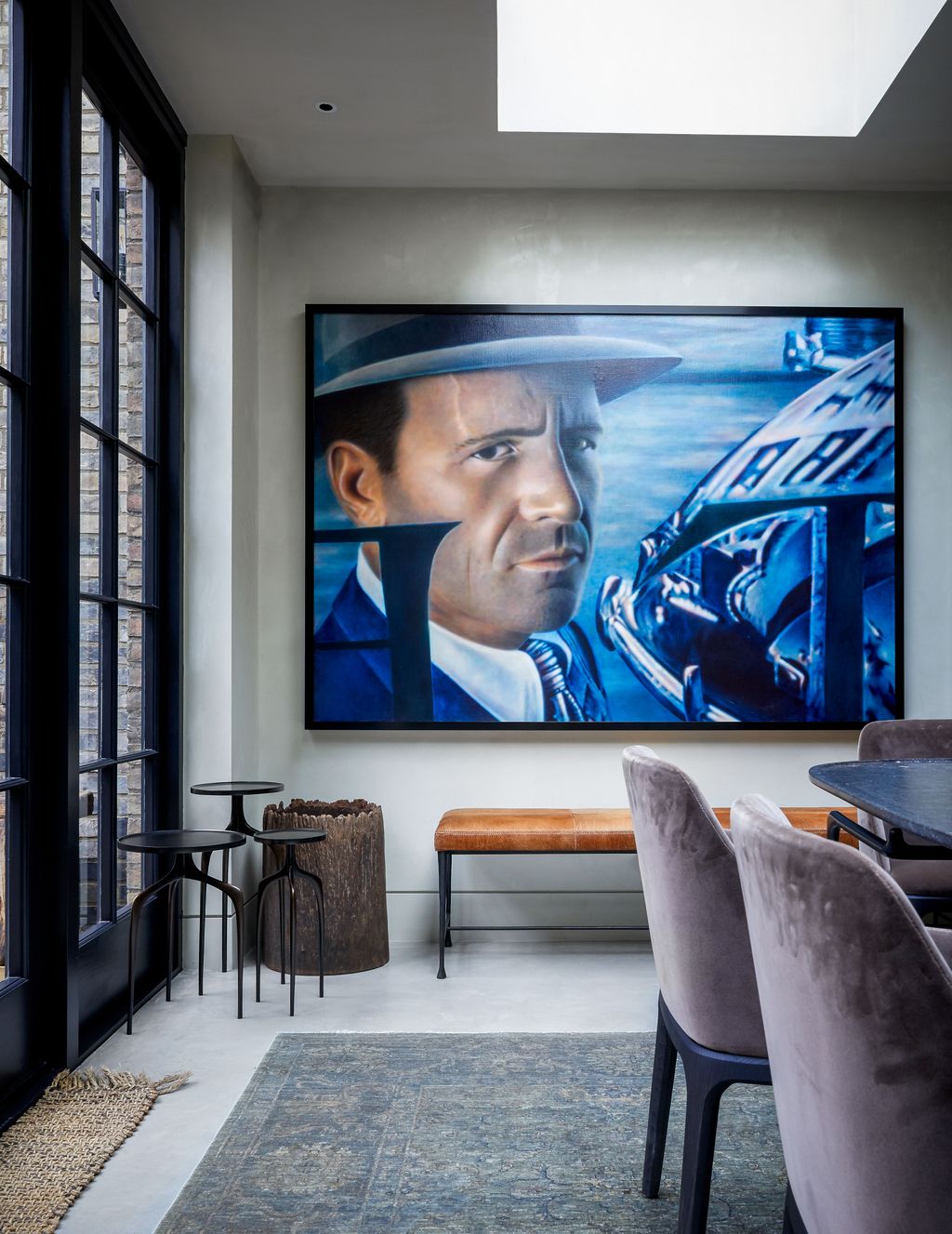 Image may contain Indoors Interior Design Furniture Chair Human Person Living Room Room Screen and Electronics