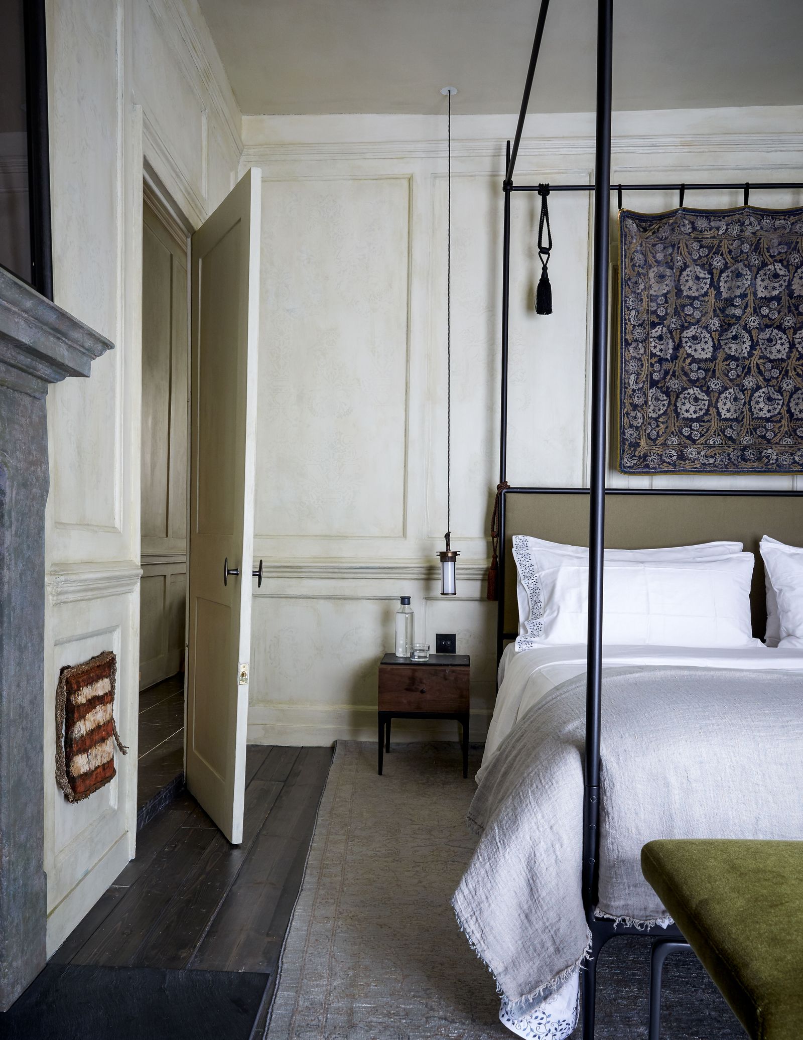 Image may contain Indoors Room Bedroom Furniture Bed Dorm Room Floor and Flooring