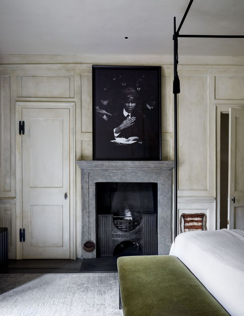 Image may contain Fireplace Indoors Furniture Hearth Human and Person