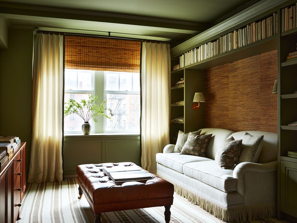 Image may contain Furniture Living Room Room Indoors Couch Interior Design Table and Flooring