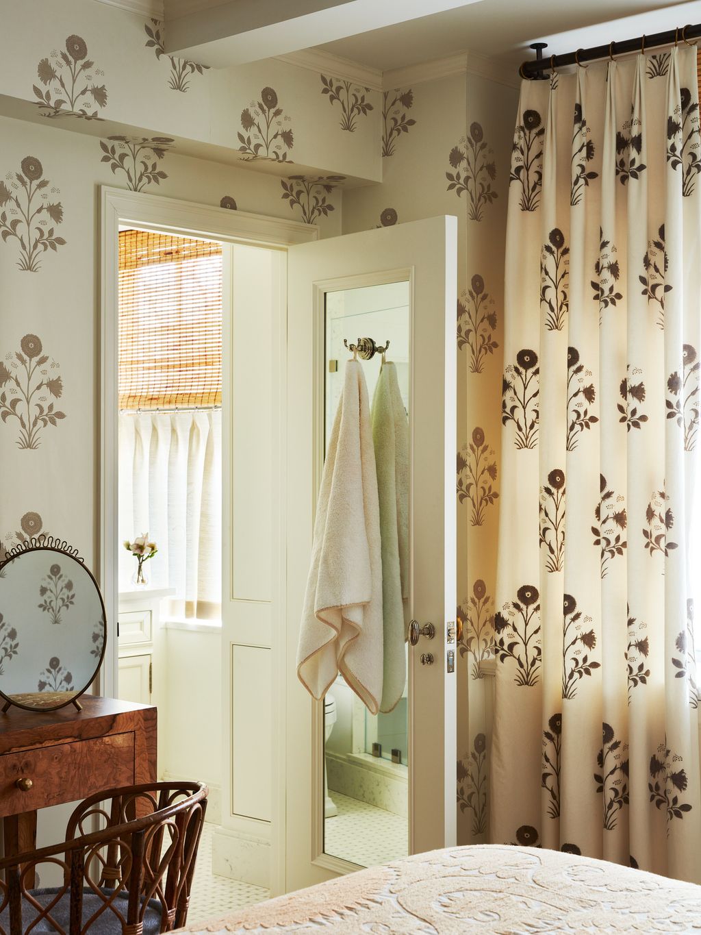 Image may contain Home Decor Furniture Chair and Curtain