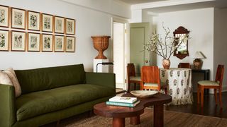 Image may contain Flower Ikebana Ornament Vase Flower Arrangement Plant Art Pottery Jar Blossom and Living Room