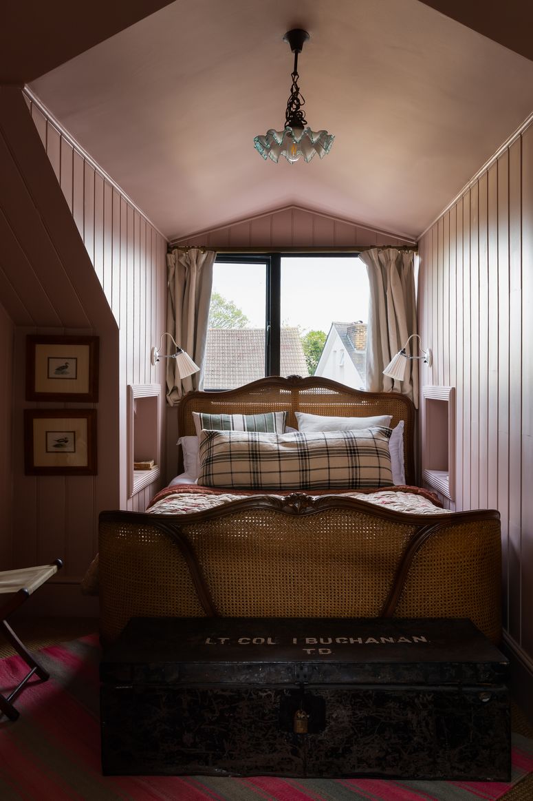 Image may contain: Furniture, Interior Design, Indoors, Room, Bedroom, Home Decor, Flooring, Bed, Cushion, and Wood