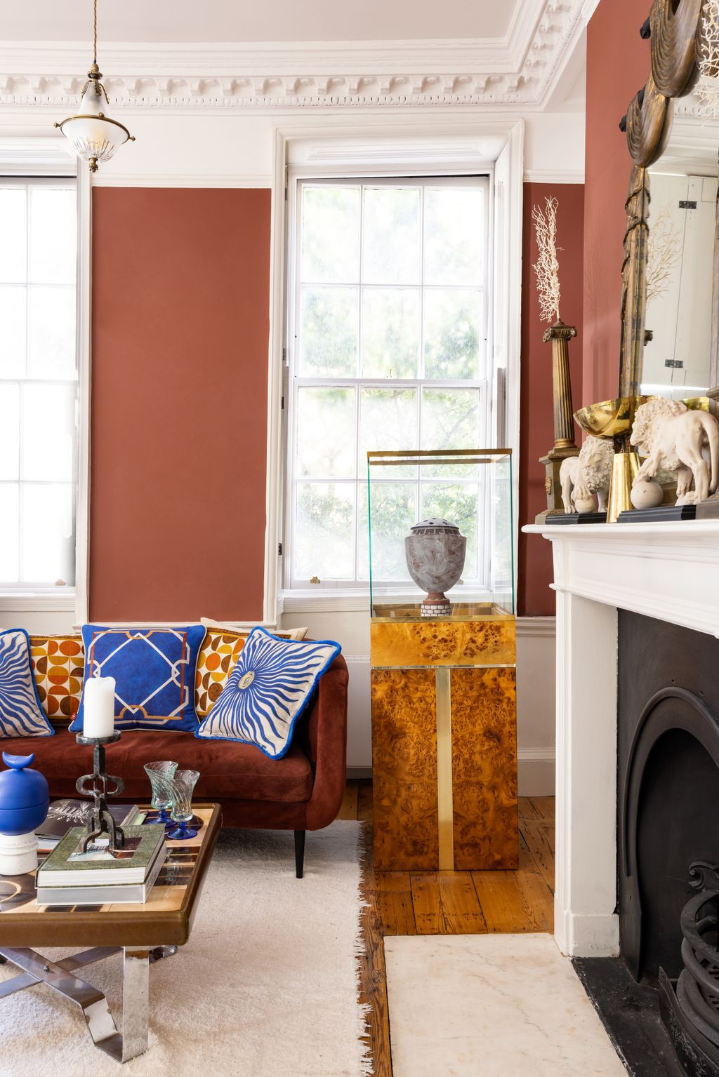 Image may contain Furniture Couch Living Room Room Indoors Table and Cushion